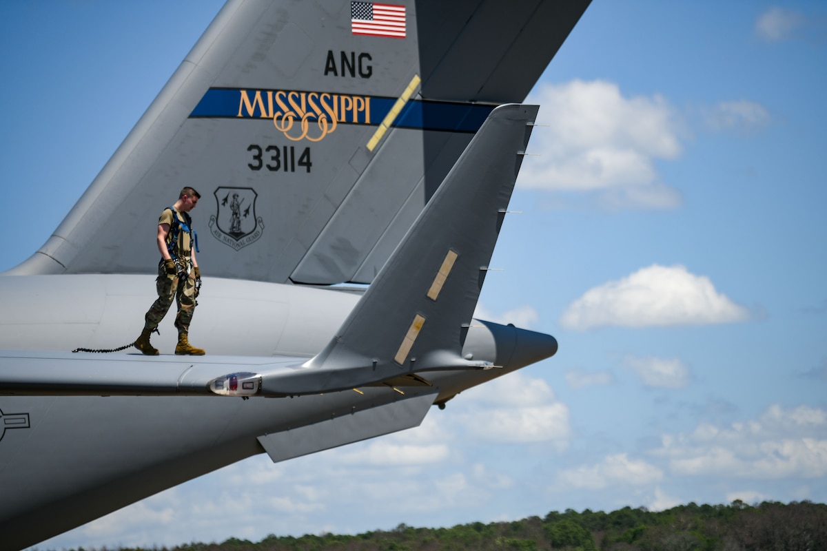 Senior Airman Aiden Faircloth, a crew chief with the 172nd Aircraft Maintenance Squadron, performs inspections on a C-17 Globemaster III during Operation Vital Force, Jackson, Mississippi, May 4, 2024. The training exercise strengthened the skills of Airmen when responding to natural disasters, aeromedical evacuation, casualty care and mortuary affairs. (U.S. Air National Guard photo by Airman 1st Class Shardae McAfee)