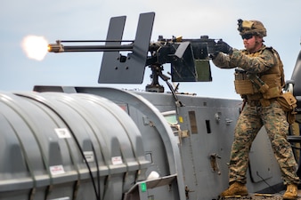 A Marine from the 24th MEU fires a .50-caliber machine gun during a training exercise aboard USS New York (LPD 21).