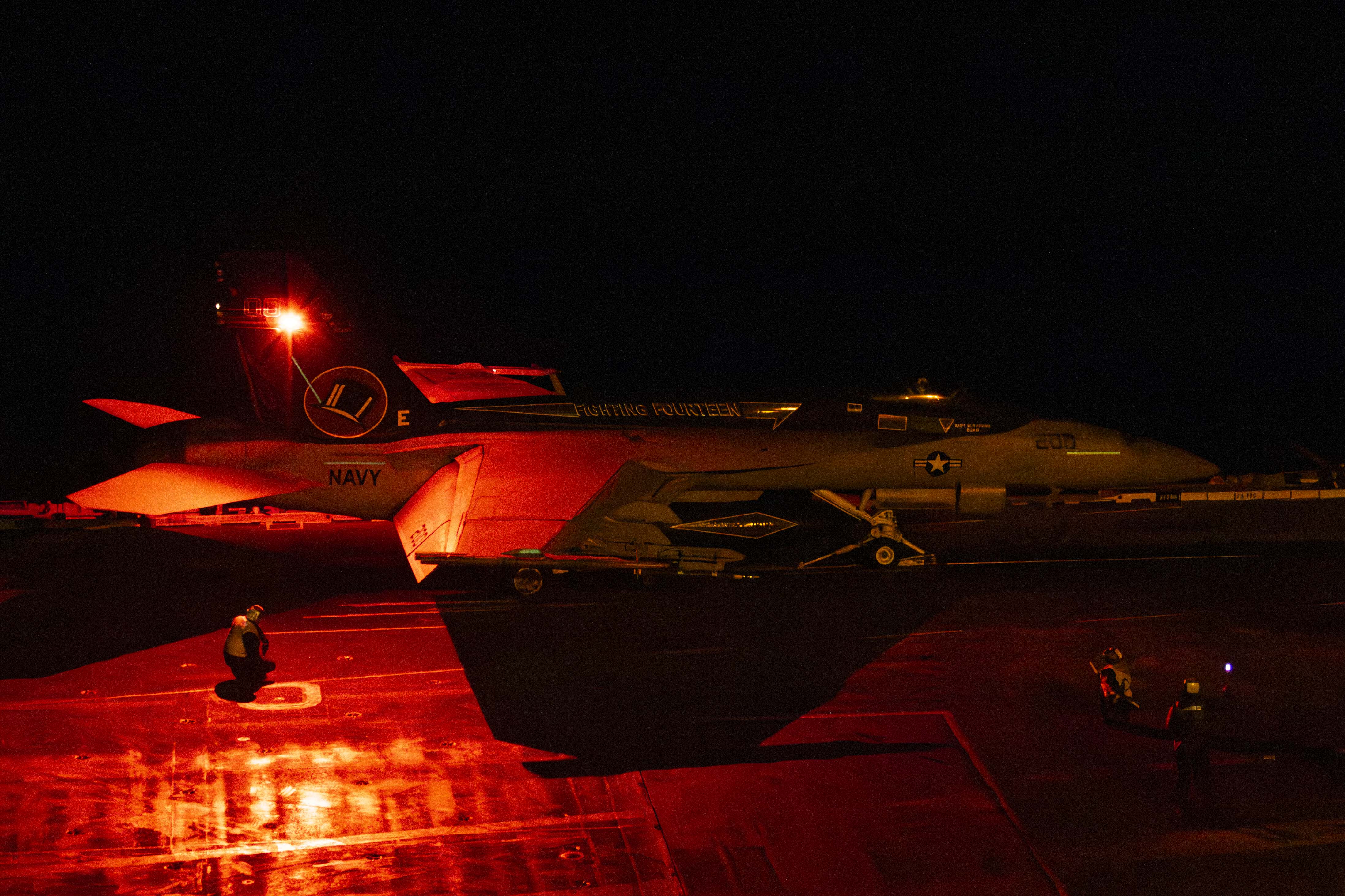 An F/A-18F from VFA-14 prepares to launch from USS Abraham Lincoln (CVN 72) during flight operations in the Pacific Ocean.