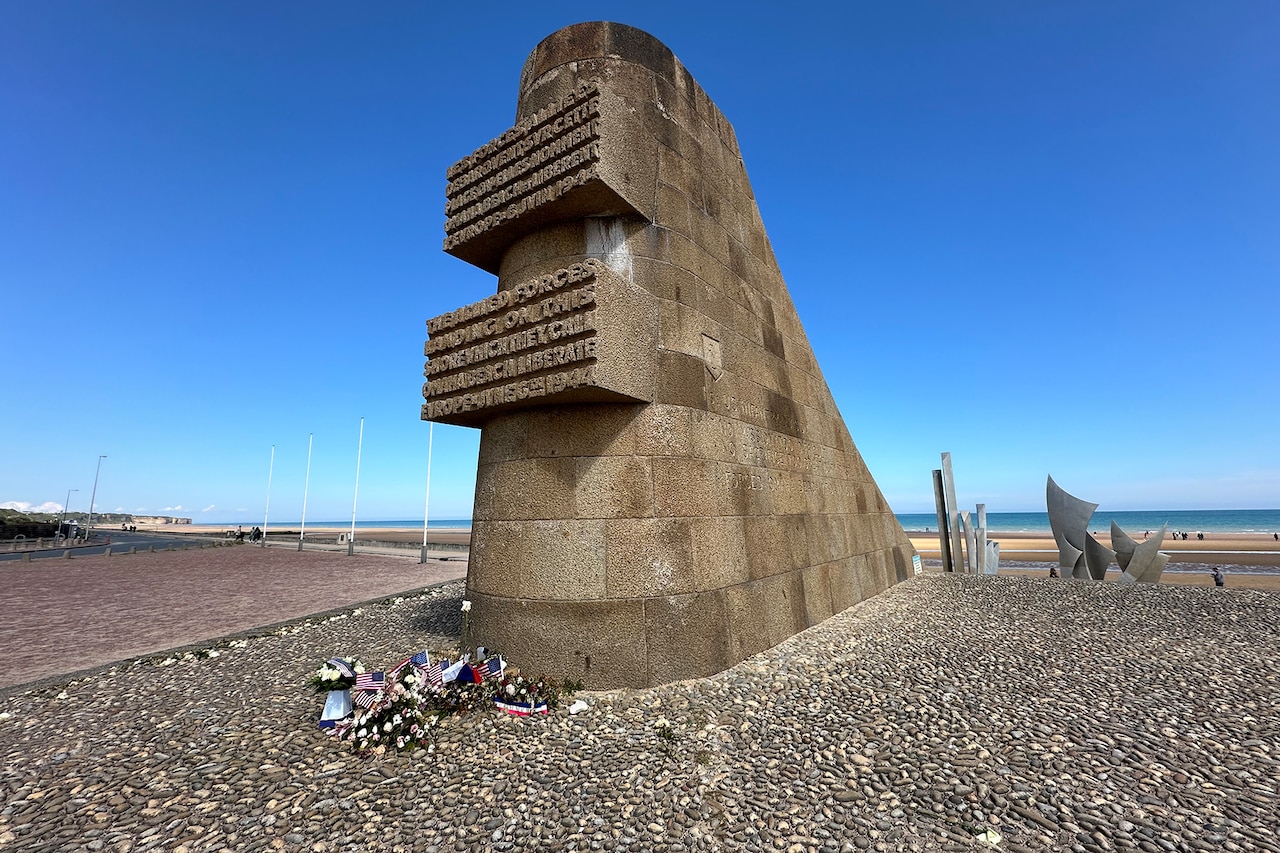 A D-Day memorial at a beach.