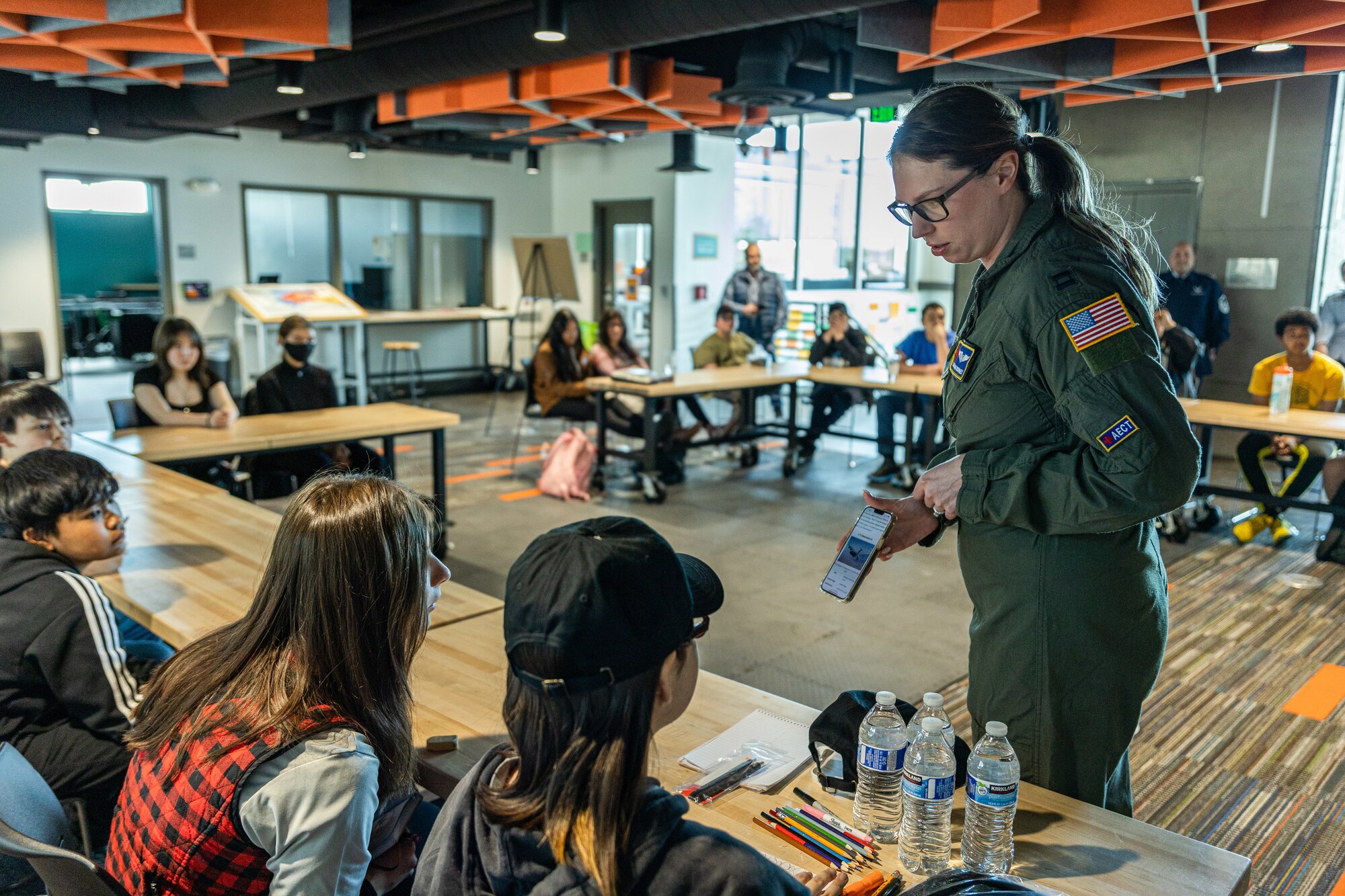 Airmen from Air Mobility Command and Joint Base McGuire-Dix-Lakehurst speak with Alaska high school students in Anchorage, Alaska May 14, 2024. Teams from AMC and JBMDL traveled to Alaska with the Indigenous Nations Equality Team to remove barriers and improve outreach, recruitment and retention. (U.S. Air Force photo by Chris Bishop)