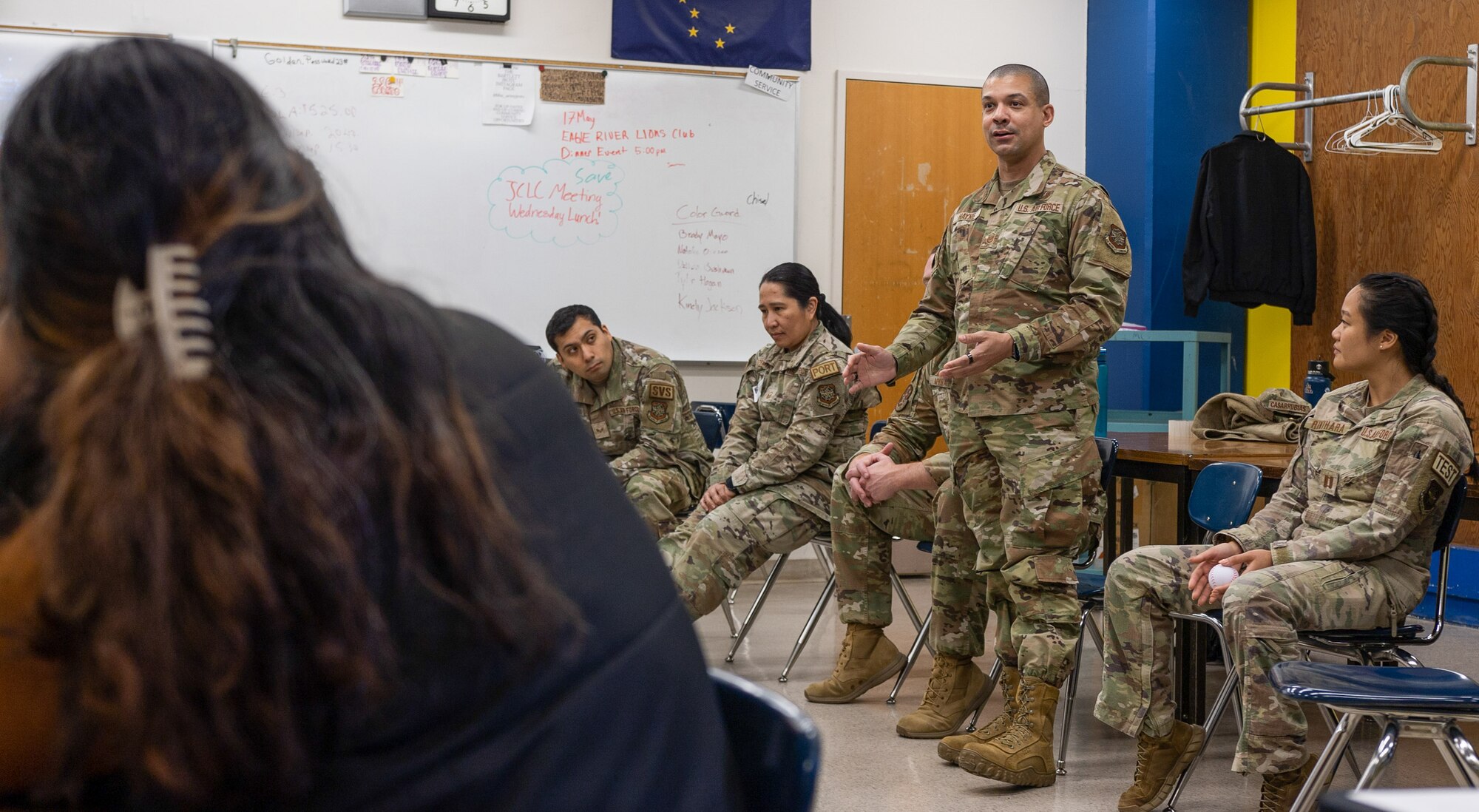 Airmen from Air Mobility Command and Joint Base McGuire-Dix-Lakehurst speak with Alaska high school students in Anchorage, Alaska May 14, 2024. Teams from AMC and JBMDL traveled to Alaska with the Indigenous Nations Equality Team to remove barriers and improve outreach, recruitment and retention. (U.S. Air Force photo by Chris Bishop)