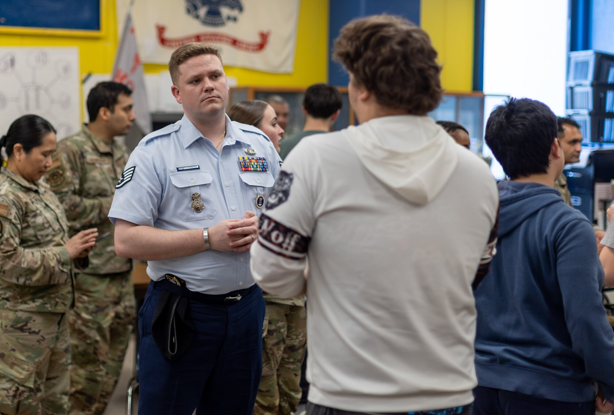 Airmen from Air Mobility Command and Joint Base McGuire-Dix-Lakehurst speak with Alaska high school students in Anchorage, Alaska May 14, 2024. Teams from AMC and JBMDL traveled to Alaska with the Indigenous Nations Equality Team to remove barriers and improve outreach, recruitment and retention. (U.S. Air Force photo by Chris Bishop)