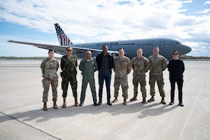 Cabo Verde military leaders pose for a picture with Airmen from the 157th Air Refueling Wing at Pease Air National Guard Base, New Hampshire, May 9, 2024. The State Partnership Program exchange enabled Cabo Verde leaders to learn more about the wing's mission and where the partners can work together as Cabo Verde explores a military aviation program.