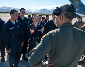 Cadets from the Alaska Military Youth Academy talk with a KC-46 crew chief at Joint Base Elmendorf-Richardson, Alaska, May 15, 2024. Airmen from AMC Headquarters and Joint Base McGuire-Dix-Lakehurst traveled to JBER for a “Warriors Recruiting Warriors” event, focusing on outreach and recruitment of Alaska Natives and Indigenous people. (U.S. Air Force photo by Rachel Sansano)