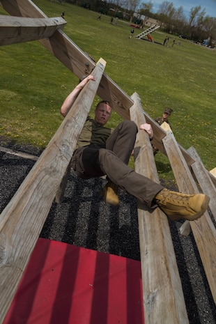 9th Marine Corps District Officer Candidates, participated in the 9th Marine Corps District Mini Officer Candidate School, at Camp Dodge Iowa, April 2, 2024. During Mini OCS officer candidates prepared mentally and physically for the rigors of OCS by completing physical fitness iterations, leadership reaction courses, confidence courses, land navigation, and Marine Corps knowledge classes. (U.S. Marine Corps photo by Cpl. Collette Hagen)