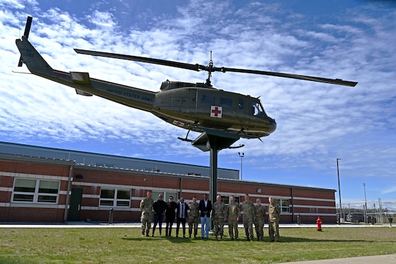New Hampshire Guardsmen and military aviators from Cabo Verde, including Col. Domingos Correia (middle), the West African nation’s director of national defense, convene at the Army Aviation Support Facility on May 10, 2024, in Concord, N.H.