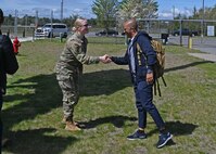 Spc. Olivia Palmiter bids farewell to Maj. Antonio Valerio, a pilot with the Cabo Verdean Armed Forces, on May 10, 2024, at the Army Aviation Support Facility in Concord, New Hampshire.