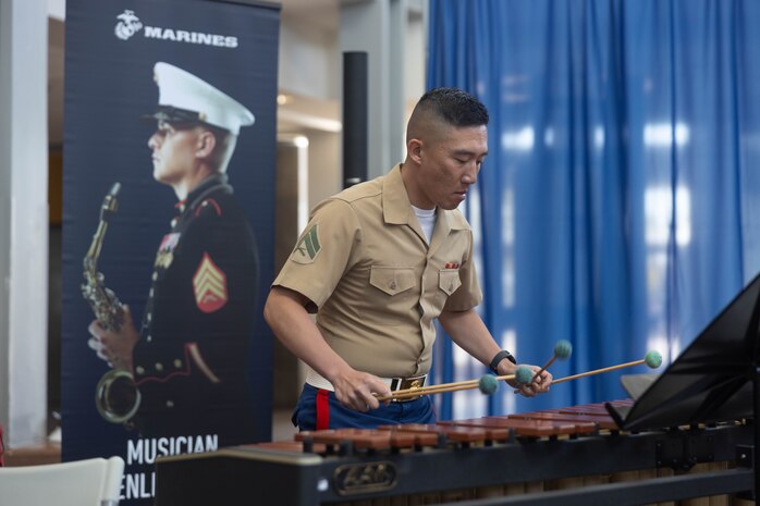 U.S. Marine Corps Cpl. Arthur Lin, a musician in the San Diego Marine Corps Jazz Ensemble, performs during a Northern California Band Association competition at Inderkum High School in Sacramento, Calif., April 27, 2024. The San Diego Jazz Ensemble attended the competition to perform, show support for local musicians and bolster knowledge of the Marine Corps Musician Enlistment Option Program. (U.S. Marine Corps photo by Sgt. Ryan Harvey)