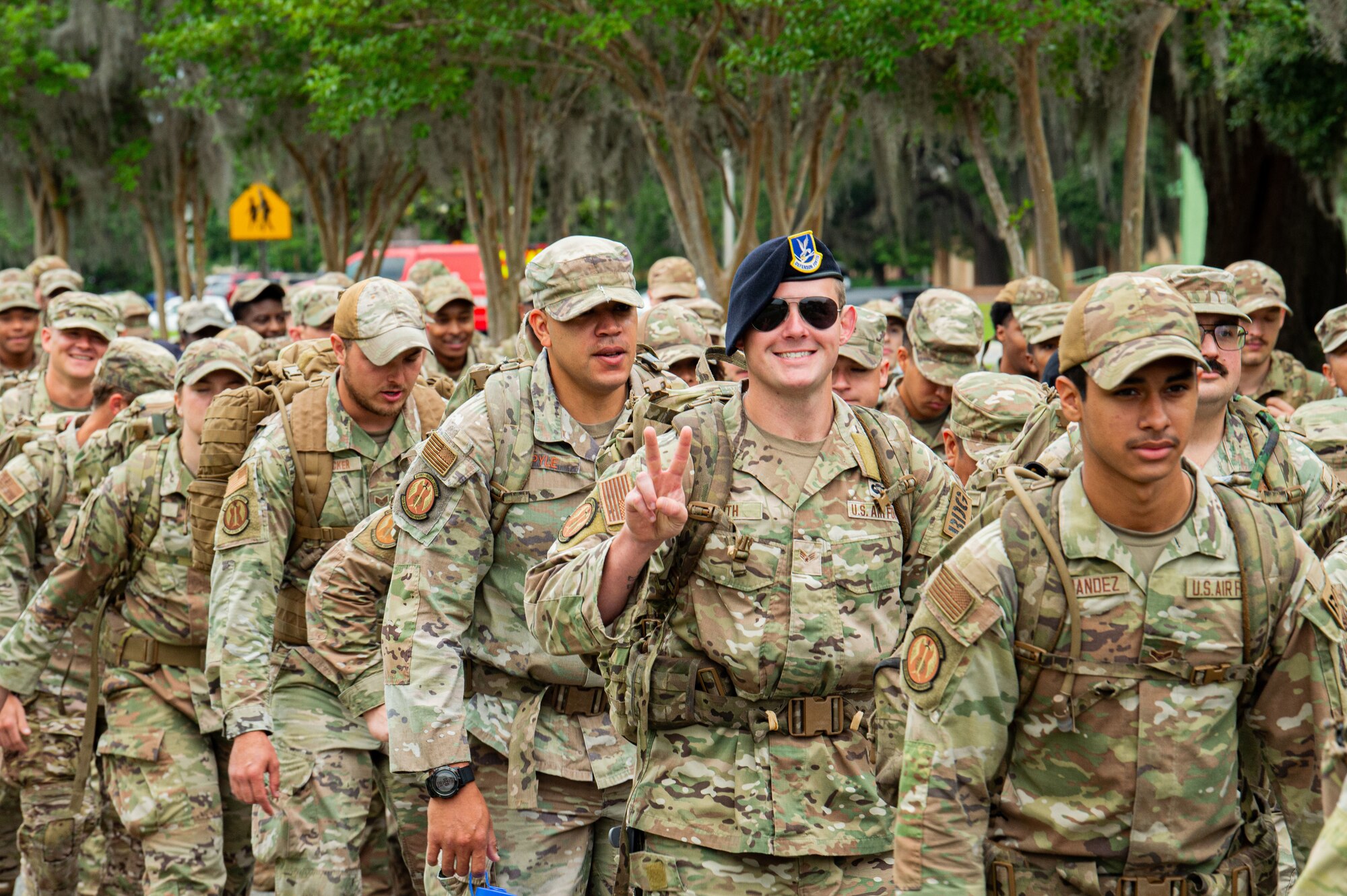 U.S. Air Force Airmen assigned to Moody Air Force Base participate in a ruck march for National Police Week at Moody Air Force Base, Georgia, May 13, 2024. Airmen were rucking in order to pay their respects to fallen law enforcement officers and symbolize carrying on their legacy. (U.S. Air Force photo by Airman 1st Class Ian Stanely)