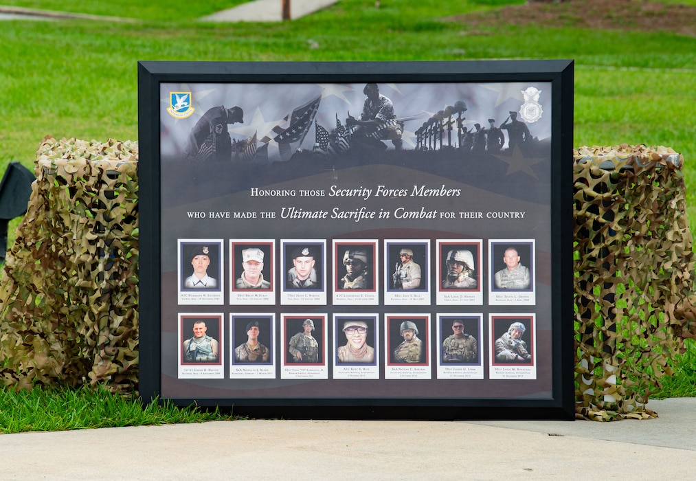 A memorial poster is displayed at the opening ceremony for National Police Week at Moody Air Force Base, Georgia, May 13, 2024. Police Week began in 1962, designating May 15 as Peace Officers Memorial Day and the surrounding week as Police Week. (U.S. Air Force photo by Airman 1st Class Ian Stanely)