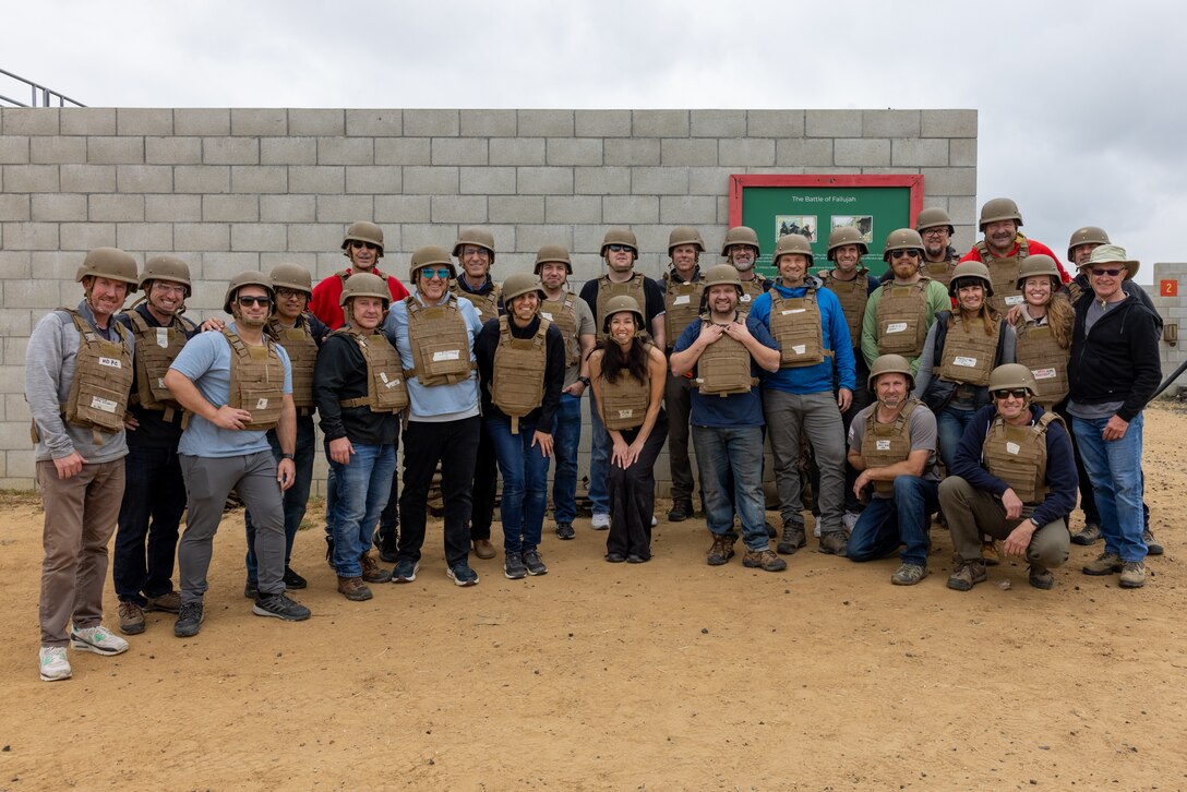Members of Vistage pose for a photo after conducting the leadership reaction course at Marine Corps Base Camp Pendleton, California, May 15, 2024. Vistage members observed recruit training in order to gain a better understanding about the transformation from recruits to United States Marines. They also received classes and briefs about benefits provided to service members serving in the United States armed forces. (U.S. Marine Corps photo by Lance Cpl. Jacob B. Hutchinson)