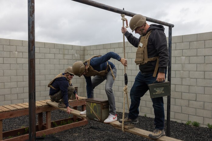Members of Vistage conduct the leadership reaction course at Marine Corps Base Camp Pendleton, California, May 15, 2024. Vistage members observed recruit training in order to gain a better understanding about the transformation from recruits to United States Marines. They also received classes and briefs about benefits provided to service members serving in the United States armed forces. (U.S. Marine Corps photo by Lance Cpl. Jacob B. Hutchinson)
