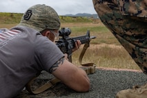 A member of Vistage participates in a live-fire range at Marine Corps Base Camp Pendleton, California, May 15, 2024. Vistage members observed recruit training in order to gain a better understanding about the transformation from recruits to United States Marines. They also received classes and briefs about benefits provided to service members serving in the United States armed forces. (U.S. Marine Corps photo by Lance Cpl. Jacob B. Hutchinson)