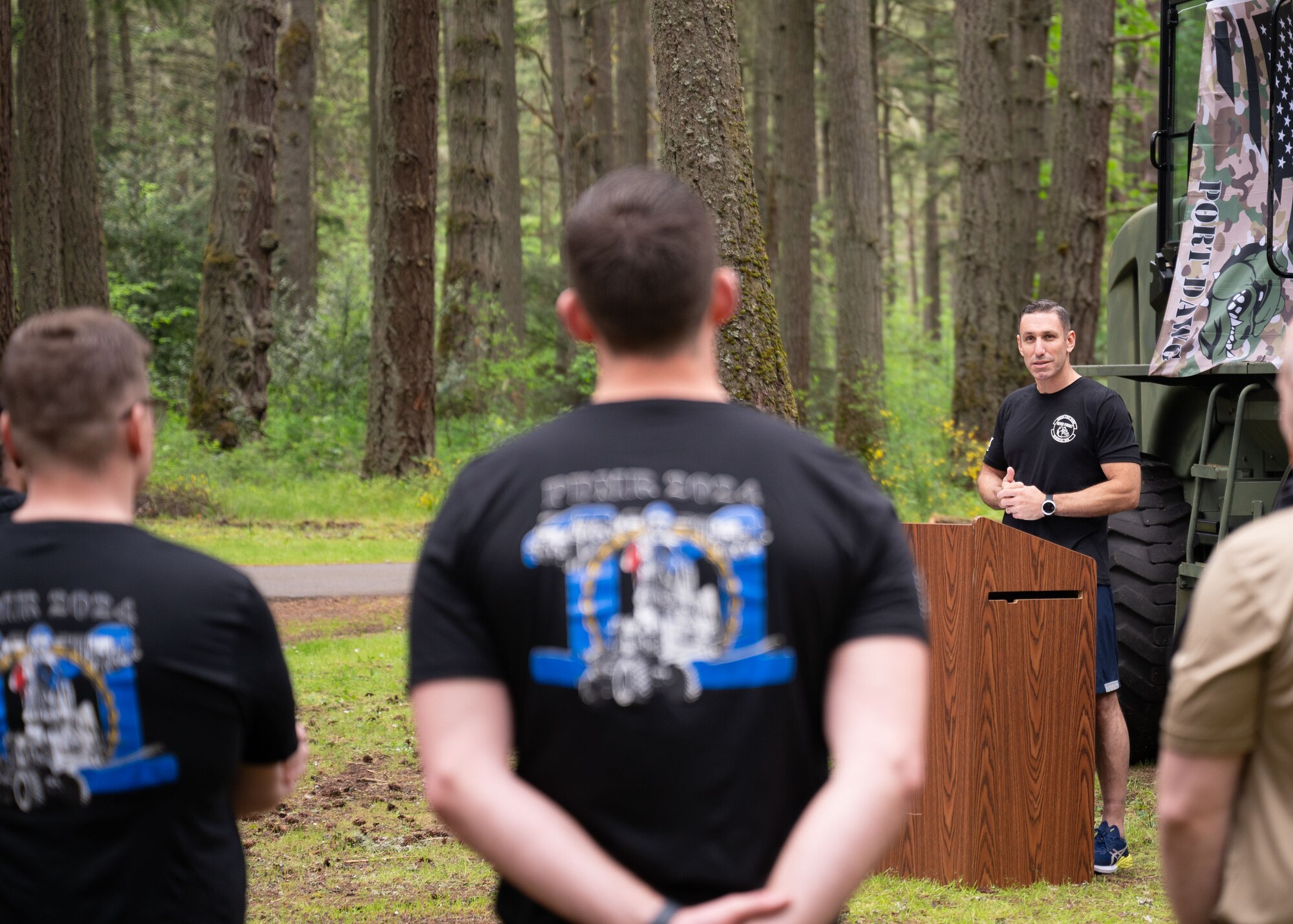 Airmen and civilians with the 62d Aerial Port Squadron participate in the Port Dawg Memorial Run at Joint Base Lewis-McChord, Washington, May 16, 2024. Air transportation Airmen and staff, commonly referred to as Port Dawgs, held the 11th annual event to honor and remember all Aerial Port Airmen who have died in the line of duty.