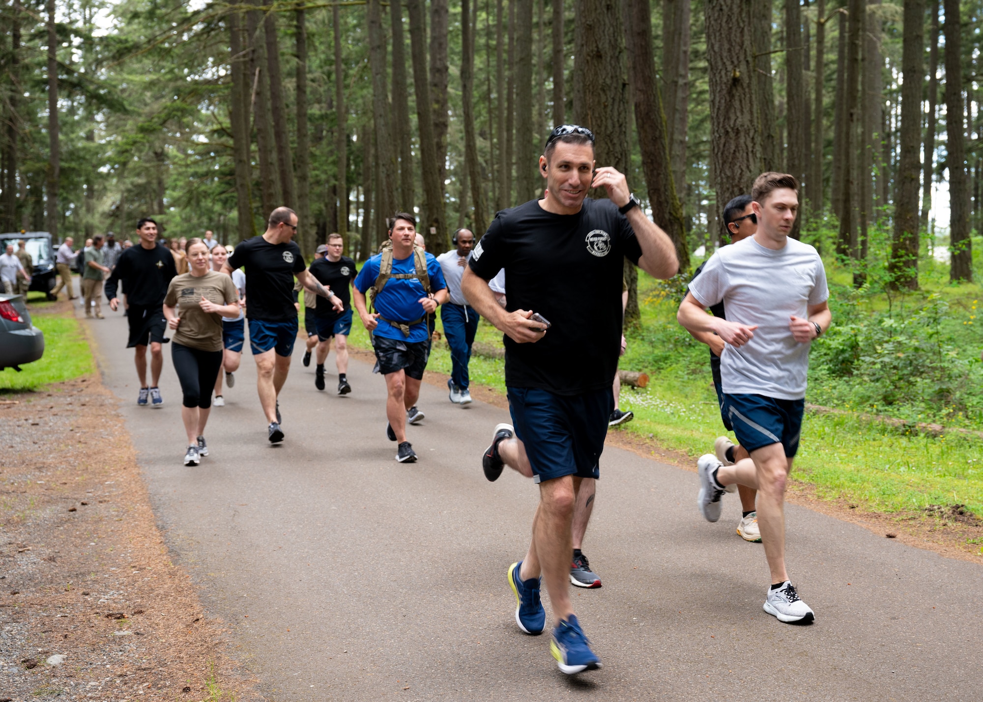 Airmen and civilians with the 62d Aerial Port Squadron participate in the Port Dawg Memorial Run at Joint Base Lewis-McChord, Washington, May 16, 2024. Air transportation Airmen and staff, commonly referred to as Port Dawgs, held the 11th annual event to honor and remember all Aerial Port Airmen who have died in the line of duty.