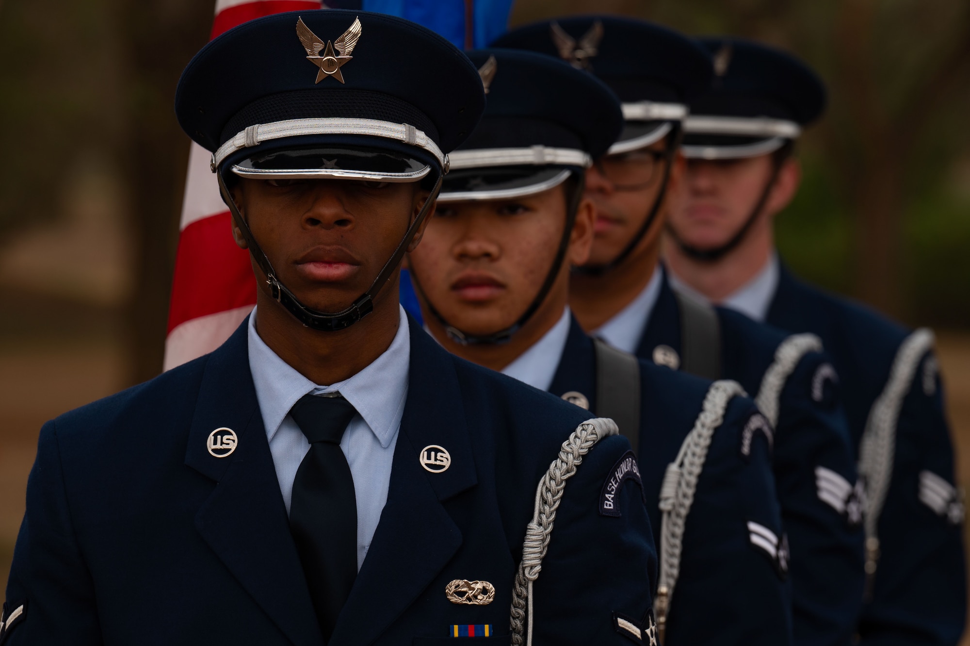 Honor guardsmen assigned to the 27th Special Operations Wing present the colors during a static display commemoration ceremony for Tail N581 “War Machine,” a Pilatus PC-12 Light Tactical Fixed Wing aircraft, at Cannon Air Force Base, New Mexico, May 16 2024. Tail N581 is the first U.S. Air Force PC-12 to be retired, having flown over 17,000 hours during its life cycle. (U.S. Air Force photo by Staff Sgt. Nicholas Swift)