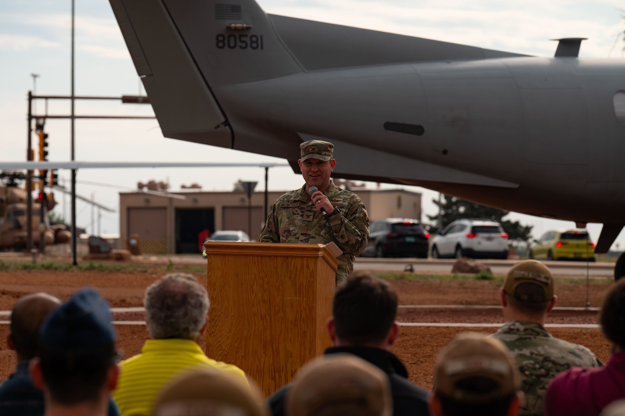 U.S. Air Force Col. Cary Mittelmark, 27th Special Operations Group commander, recites the history of Tail N581 “War Machine,” a Pilatus PC-12 Light Tactical Fixed Wing aircraft, during a static display commemoration ceremony at Cannon Air Force Base, New Mexico, May 16, 2024. The PC-12 played a vital role in the formation of the Non-Standard Aviation (NSAV) community and the re-activation of the 318th Special Operations Squadron in 2008. (U.S. Air Force photo by Staff Sgt. Nicholas Swift)