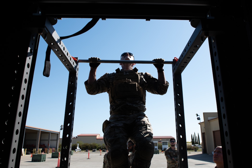 Airmen does pushups during a Warrior Challenge