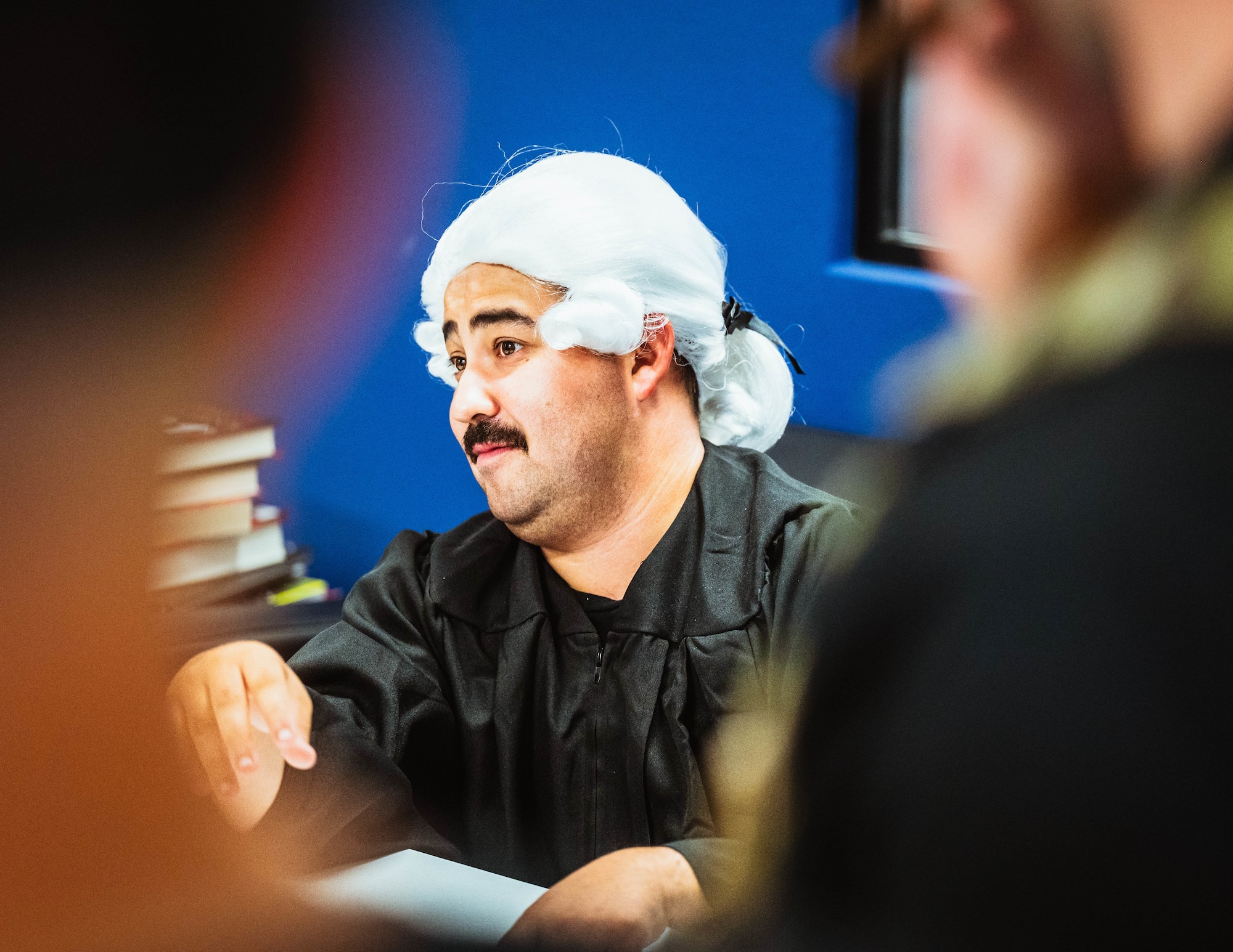 U.S. Air Force Chief Master Sergeant Jason Shaffer, 56th Fighter Wing command chief, participates during a jail and bail event for the 2024 Police Week.
