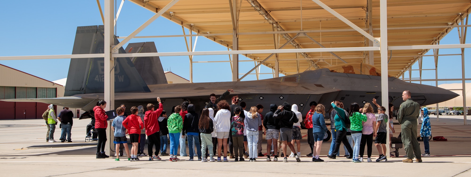 In partnership with STARBASE, the 411th Flight Test Squadron hosted 35 students for an opportunity of a lifetime. They were to experience a flight simulator followed by a tour of the F-22 Raptor, the most advanced and sophisticated fighter jet in the world. (photo by Ethan Wagner, Lockheed Martin)
