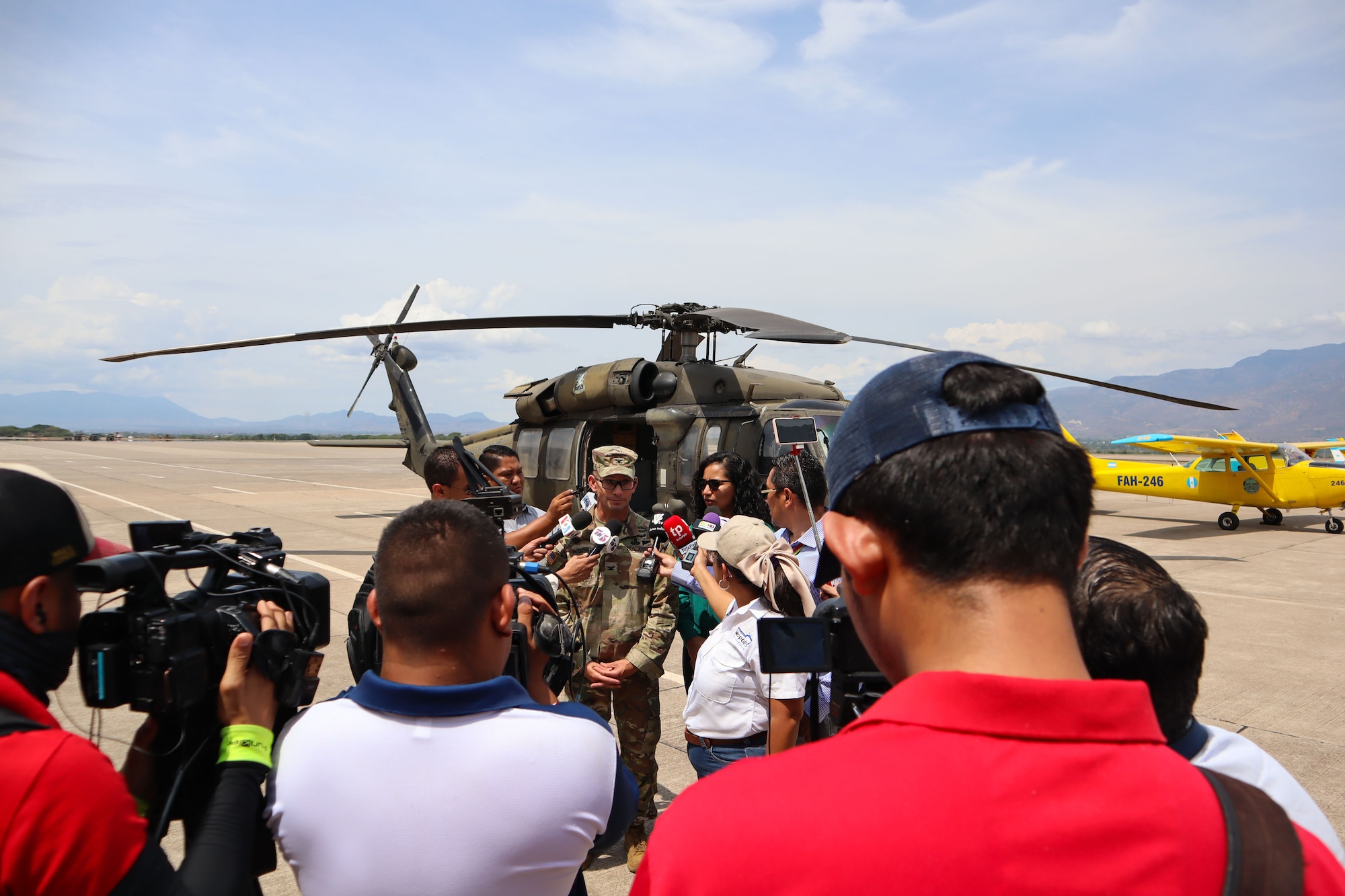 A photo of a soldier talking to media.