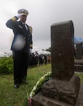 Capt. Rafael Facundo, deputy commander and chief of staff at U.S. Naval Forces Japan, renders honors alongside Sailors assigned to the Avenger-class mine countermeasures ship USS Warrior (MCM 10) during a ceremony at Hakodate Foreign General Cemetery in remembrance of George Remick and James Wolfe, two U.S. Navy Sailors who served under Commodore Matthew Perry and died in Hakodate in 1854 due to illness.