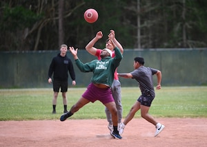 security forces members playing kickball