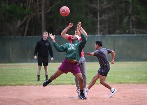 security forces members playing kickball