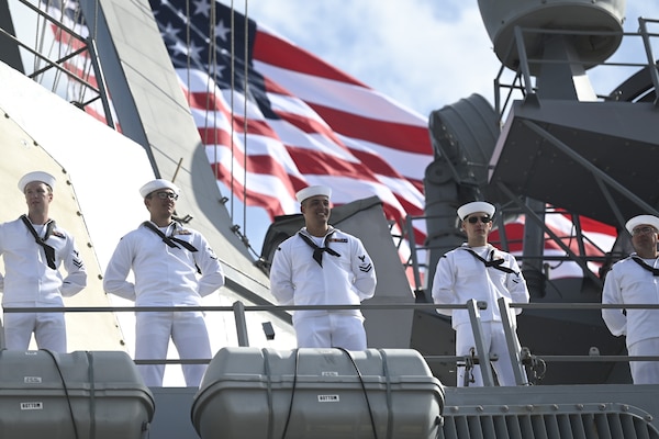 Sailors man the rails of Arleigh-Burke class guided-missile destroyer USS Carney (DDG 64) as it ends a seven month deployment and returns to homeport Naval Station Mayport.