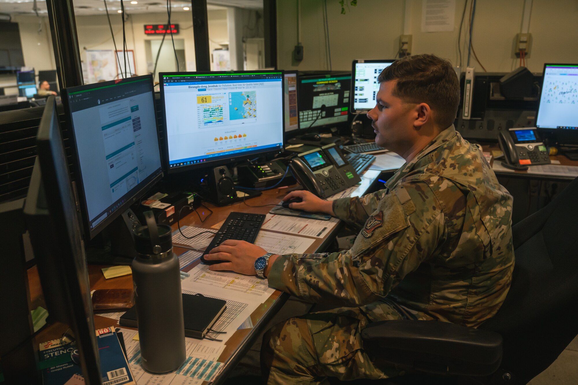 Staff Sgt. Brandon Fletcher, 8th Fighter Wing Command Post non-commissioned officer in charge of systems, works in the command center at Kunsan Air Base, Republic of Korea