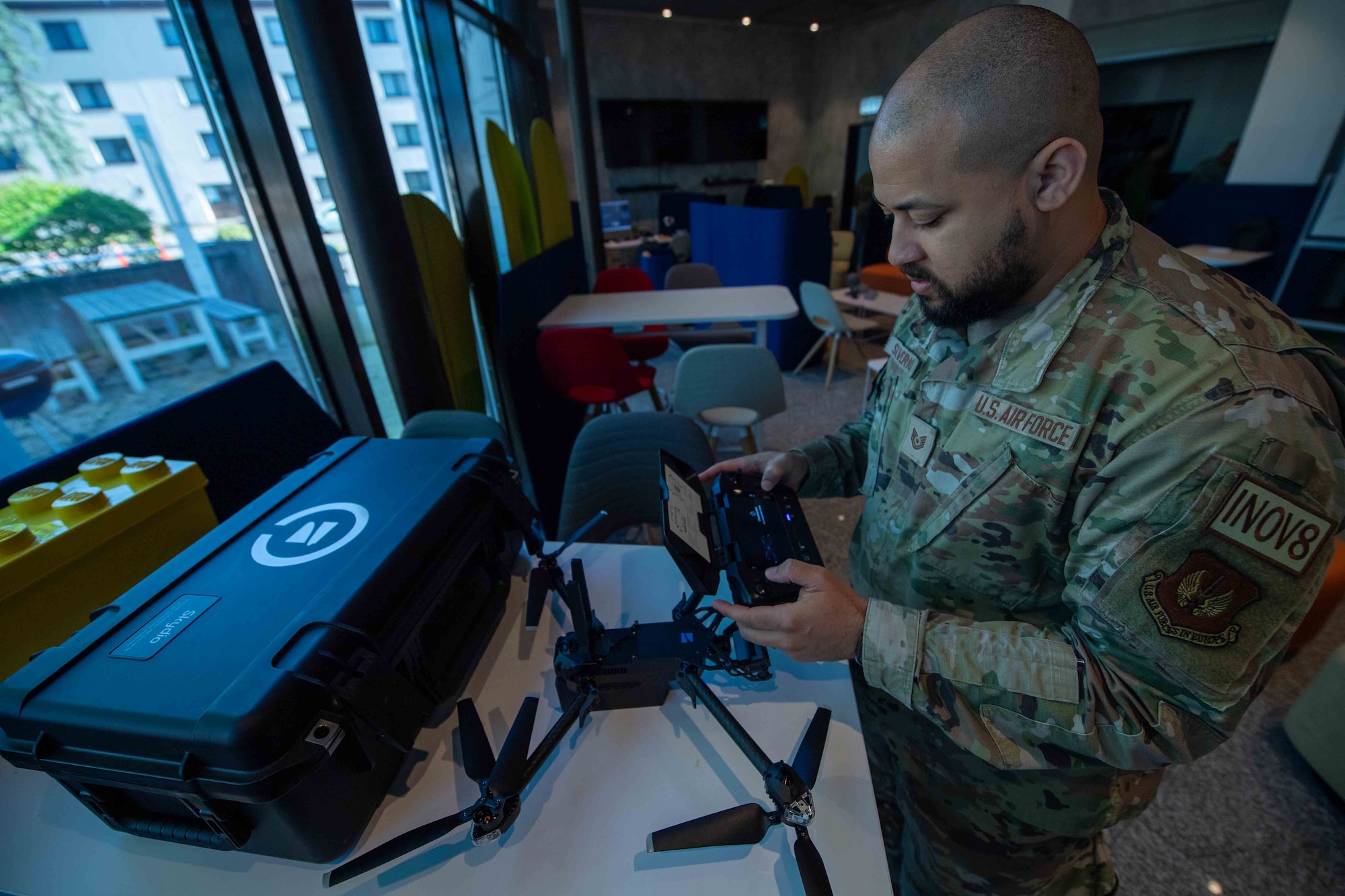 A man works with a device