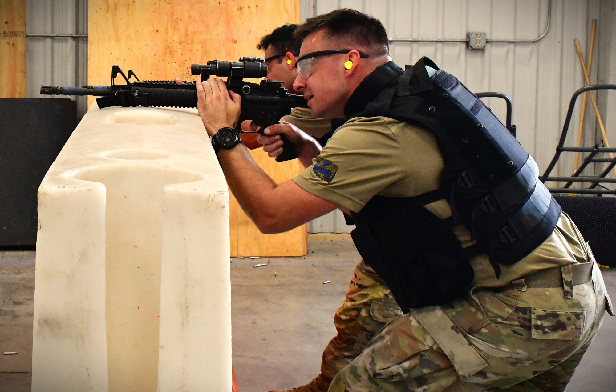 defenders shooting guns