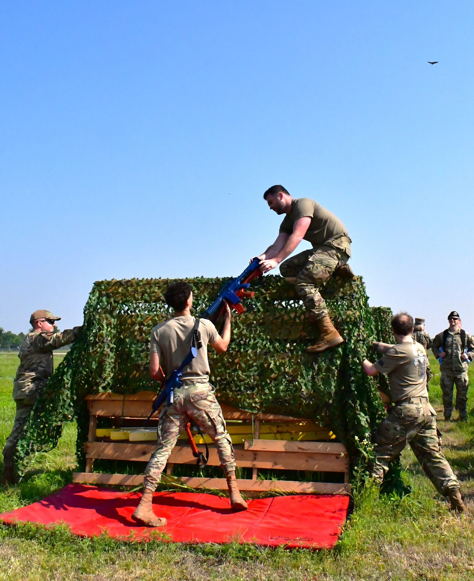 man jumping over obstacle