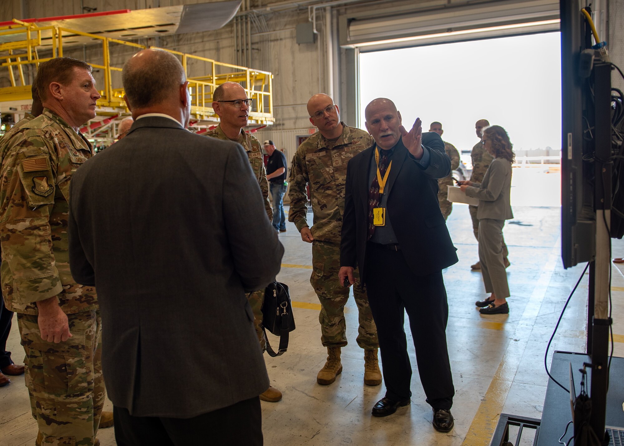 Group of people talking in industrial space