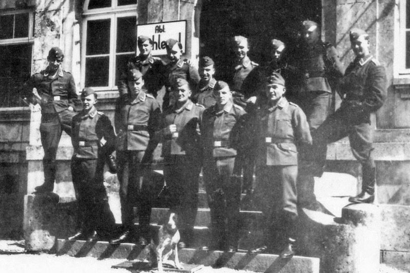 Soldiers pose for a photo.