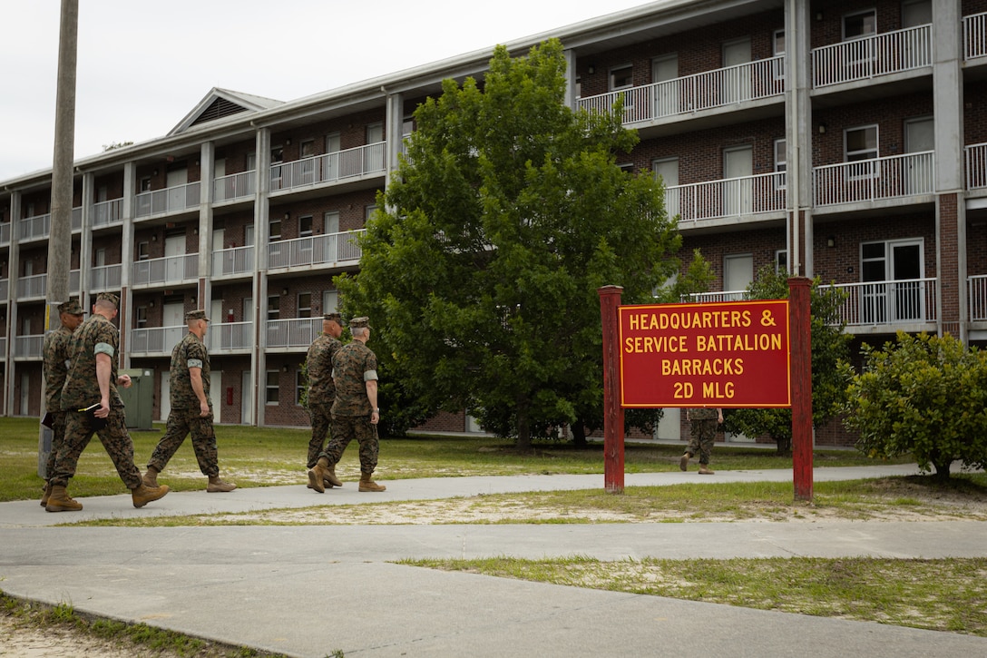 U.S. Marine Corps Gen. Christopher J. Mahoney, the assistant commandant of the Marine Corps (ACMC), visits barracks building FC504 with Marine Corps Installations East-Marine Corps Base (MCB) Camp Lejeune and 2nd Marine Logistics Group (MLG) leaders on MCB Camp Lejeune, North Carolina, May 14, 2024. The ACMC visited MCB Camp Lejeune to view current barracks living conditions and observe 2nd MLG and II Marine Expeditionary Force’s capabilities. (U.S. Marine Corps photo by Cpl. Antonino Mazzamuto)