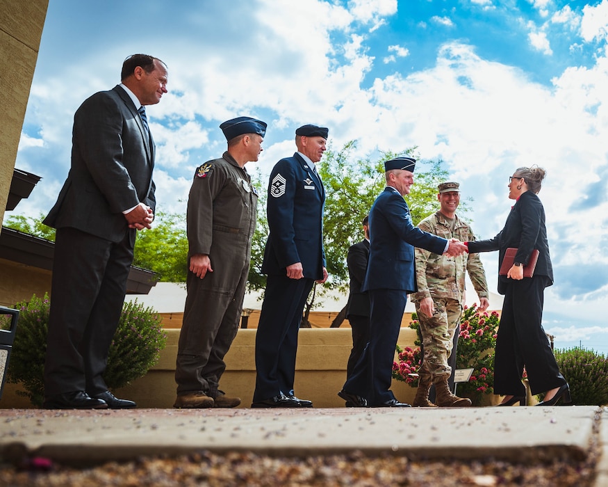 Arizona Governor Katie Hobbs is greeted by U.S. Air Force Brig. Gen. Jason Rueschhoff, 56th Fighter Wing commander.