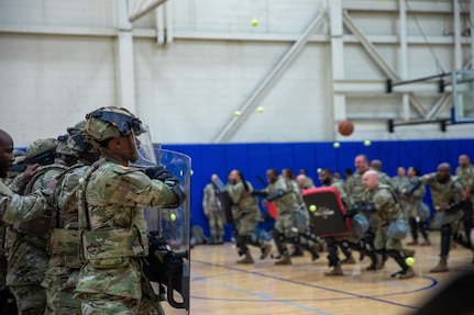 U.S. Army Soldiers with the 372nd Military Police Battalion, District of Columbia Army National Guard participate in a joint training event with the 113th Security Forces Squadron at Fort Belvoir, Va. May 18, 2024. The training engages members of the D.C. National Guard to improve interoperability and familiarity to ensure personnel are ready to support civilian lead agency partners involved in high-profile events across the DMV.