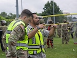 U.S. Army Soldiers with the 372nd Military Police Battalion, District of Columbia Army National Guard participate in a joint training event with the 113th Security Forces Squadron at Fort Belvoir, Va. May 19, 2024. The training engages members of the D.C. National Guard to improve interoperability and familiarity to ensure personnel are ready to support civilian lead agency partners involved in high-profile events across the DMV.