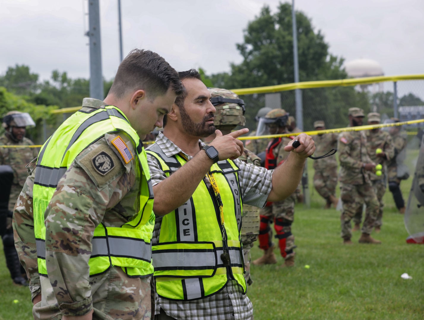 U.S. Army Soldiers with the 372nd Military Police Battalion, District of Columbia Army National Guard participate in a joint training event with the 113th Security Forces Squadron at Fort Belvoir, Va. May 19, 2024. The training engages members of the D.C. National Guard to improve interoperability and familiarity to ensure personnel are ready to support civilian lead agency partners involved in high-profile events across the DMV.