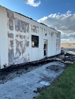 The aftermath of a fire in the Tri Rivers NRM Building at Ice Harbor Lock and Dam in Burbank, WA