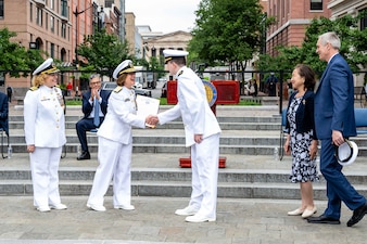 Chief of Naval Operations Adm. Lisa Franchetti shakes hands with newly commissioned officers during George Washington University Naval Reserve Officers Training Corps (NROTC) commissioning ceremony at the Navy Memorial in Washington D.C., May 20, 2024.  The spring 2024 commissioning class consisted of 25 graduating midshipmen and enlisted Marines from George Washington University, Georgetown University, and The Catholic University of America. (U.S. Navy photo by Chief Mass Communication Specialist Amanda R. Gray)
