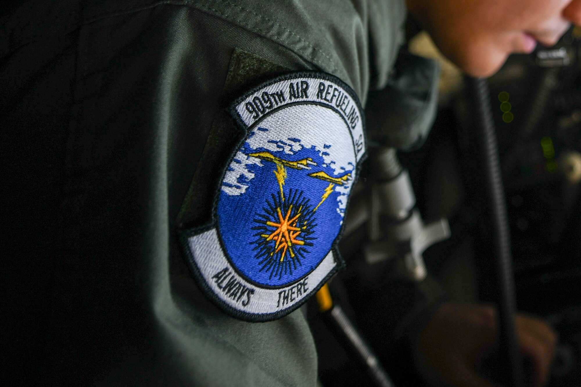 A close up shot of a 909th Air Refueling Squadron patch.
