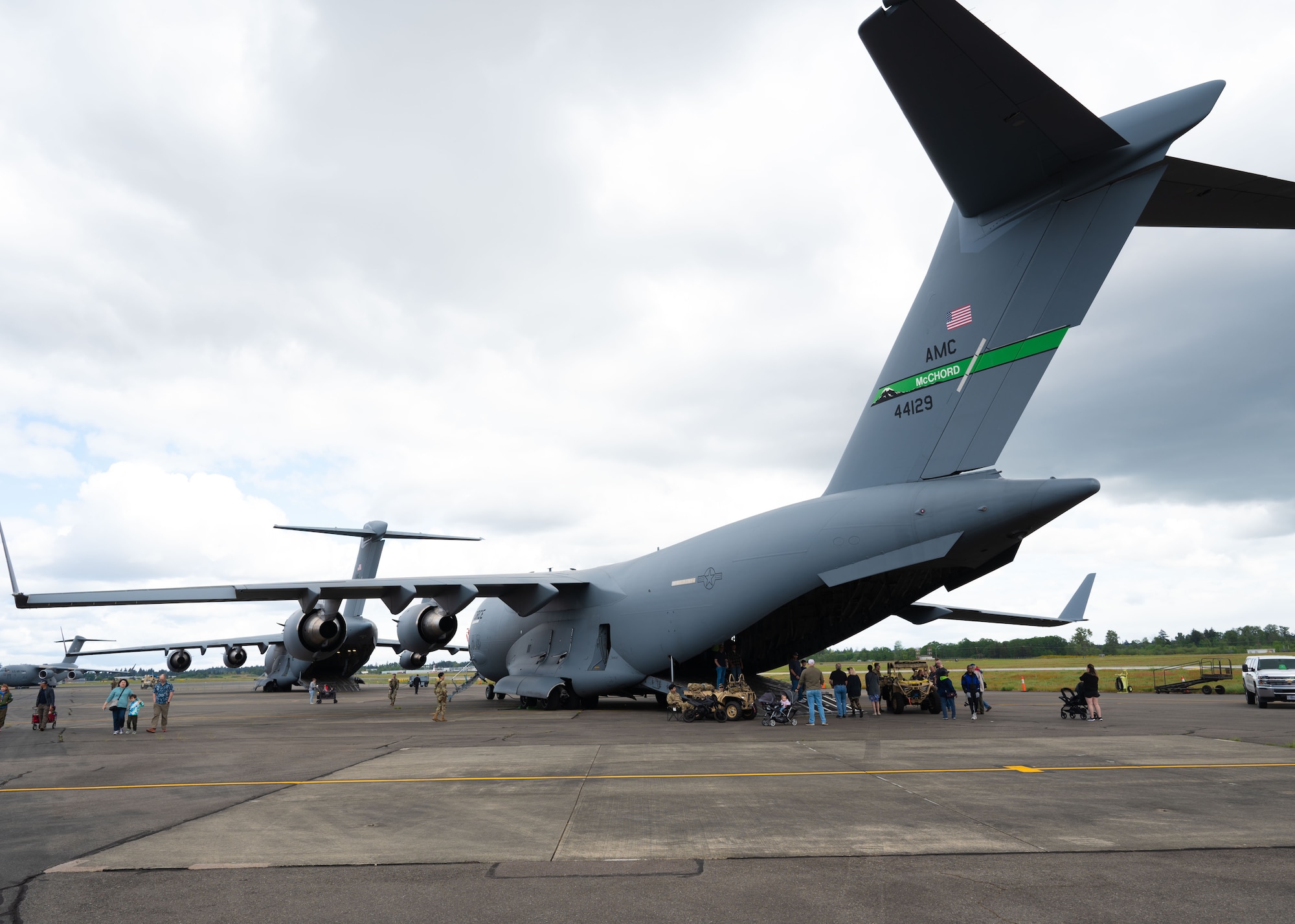Team McChord opened their gates to the public for a day of, military aircraft and vehicle displays, war reenactments, live music and food.