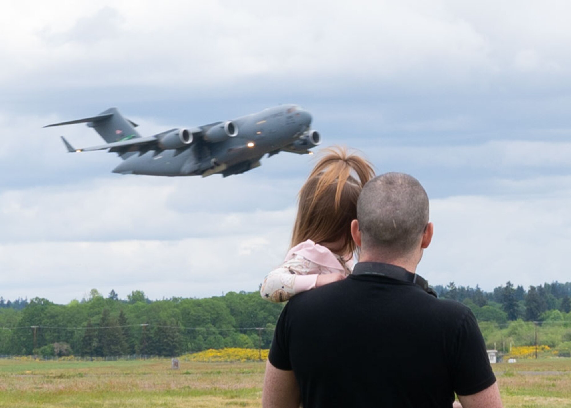 Team McChord opened their gates to the public for a day of, military aircraft and vehicle displays, war reenactments, live music and food.