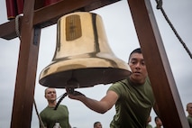New U.S. Marines with Charlie Company, 1st Recruit Training Battalion, ring the 1st Battalion liberty bell during their motivational run at Marine Corps Recruit Depot San Diego, California, May 16, 2024. The motivational run is the last physical training exercise Marines conduct while at MCRD. (U.S. Marine Corps photo by Cpl. Sarah M. Grawcock)