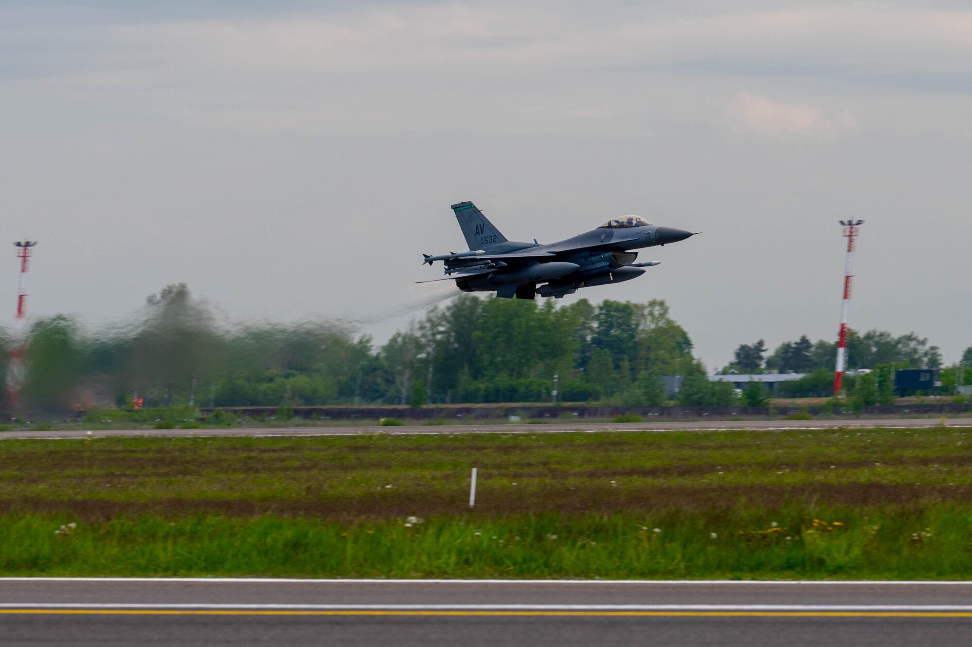 An F-16 takes off.