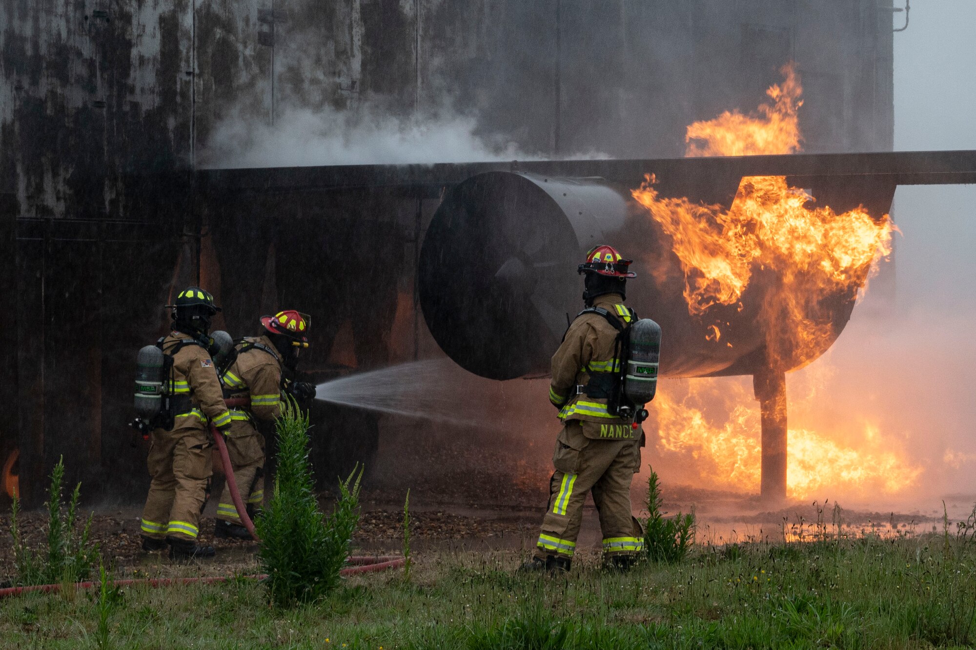 The 100th CES practiced fire suppression techniques during a simulated aircraft fire.