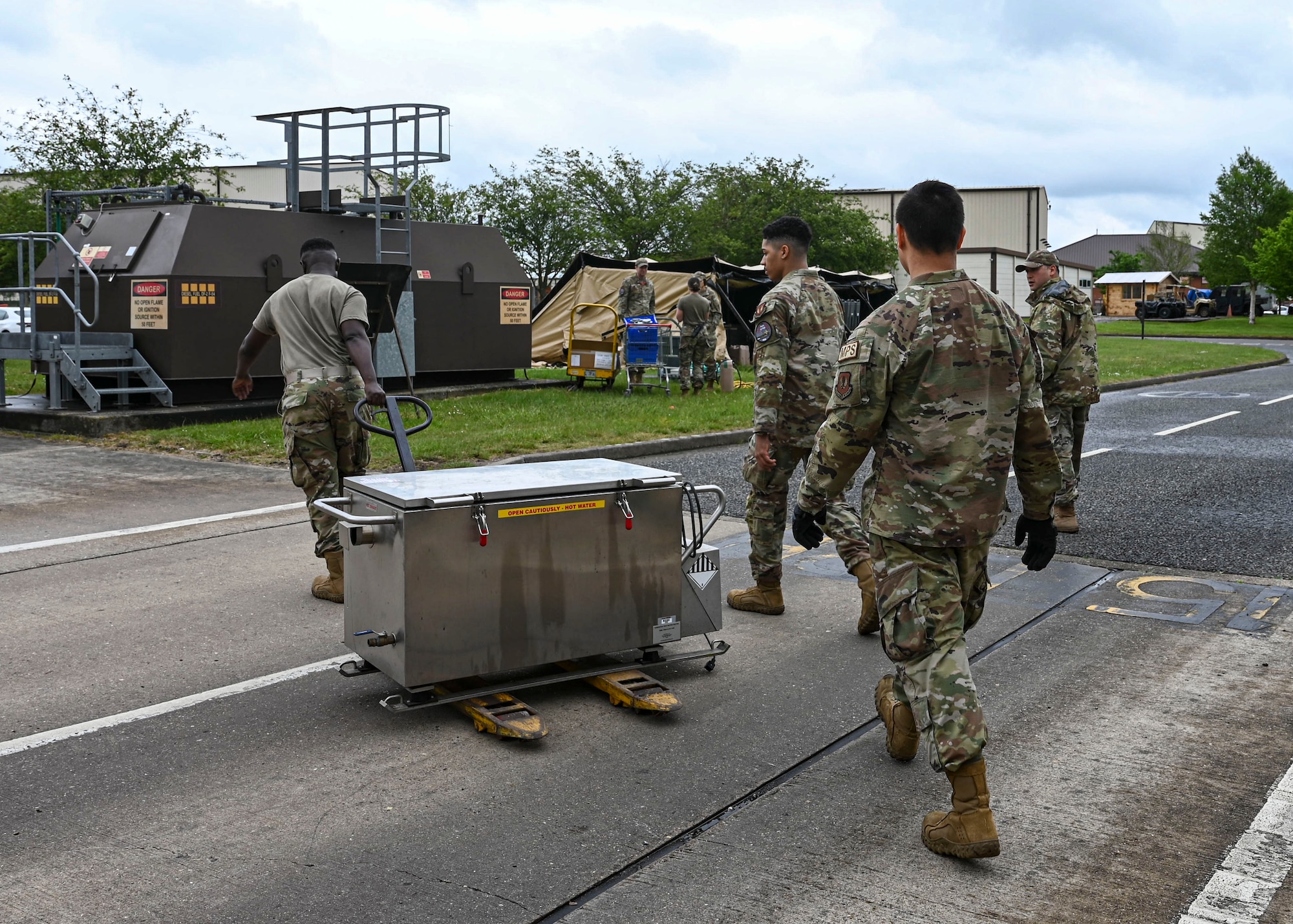 The 100th FSS Airman simulated setting up a mission-capable deployment kitchen to keep the installation ready for real-world scenarios.
